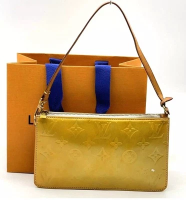 Auténtico bolso Louis Vuitton Vernis amarillo Lexington M91058 con bolsa Foto 1 de 4