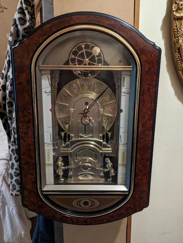 Small World Rhythm Sign Of The Times Zodiak Clock 4Mh744NR Cover