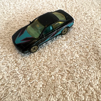 Tarjeta corta vintage 1993 Matchbox Ford Probe GT, MB 44, negra, 1/64 Foto 1 de 4