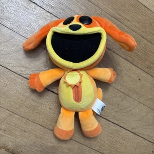 Peluche Poppy Playtime Smiling Critters DOGDAY Orange Dog Day 2024 - Imagen 1 de 3