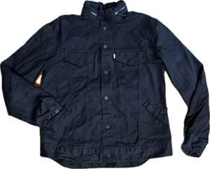 Chaqueta utilitaria Levi Strauss Commuter Travel Trucker capucha negra para hombre L - Imagen 1 de 16