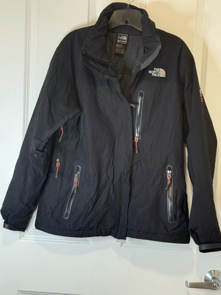 Chaqueta de esquí snowboard negra para mujer The North Face Summit Series HyVent Alpha L Foto 1 de 4
