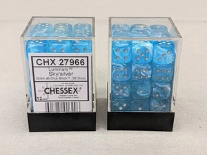 Chessex 27966 Luminary 12mm D6 Glow in the Dark Dice Set, Sky with Silver - Picture 1 of 3