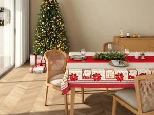Klassische weihnachtliche Tischdecke mit Druck des Weihnachtsmanns und des roten Weihnachtssterns. - Bild 1 von 1