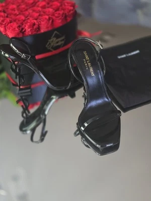 Tacones Saint Laurent para mujer YSL Opyum 110 negros con correa al tobillo talla EU38/US8 Foto 1 de 4