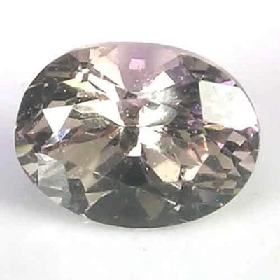 MYSTICAL NATURAL SILVER PURPLE COLOR AFRICAN MALAYA GARNET GEM - OVAL CUT - Image 1 of 4