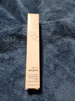 Sombra de ojos líquida BECCA Cosmetics Light Gleam Primer & Topper Red Star nueva en caja Foto 1 de 2