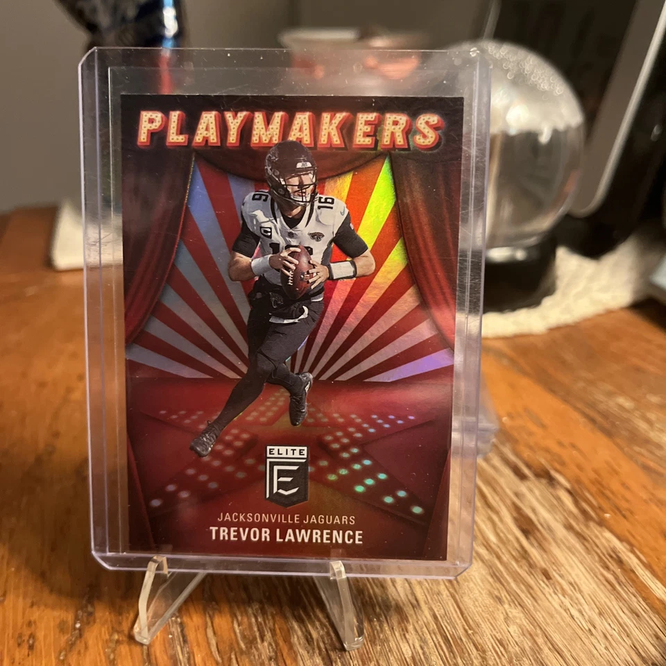 2022 DONRUSS ELITE PLAYMAKERS  PM-11 TREVOR LAWRENCE JAGUARS - Image 1 of 2