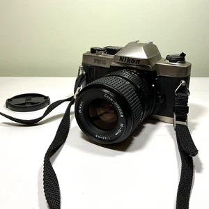 Nikon FM-10 35mm SLR Film Camera 35~70mm Nikkor Zoom Focus Lens Vintage Retired - Picture 1 of 24