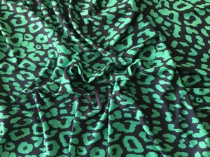 Green leopard print Viscose Lycra Stretch Jersey Dress Fabric 150 Cm Wide - Picture 1 of 2