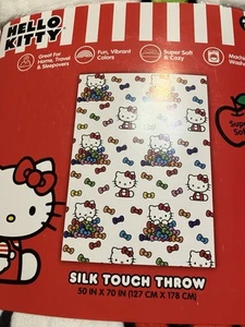 HELLO KITTY SEDA TACTO TIRO BLANCO CON PAJARITAS 50" X 70" - Imagen 1 de 2