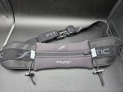 Cinturón de running ajustable Fitletc con bolsa y palancas para número de babero Foto 1 de 2