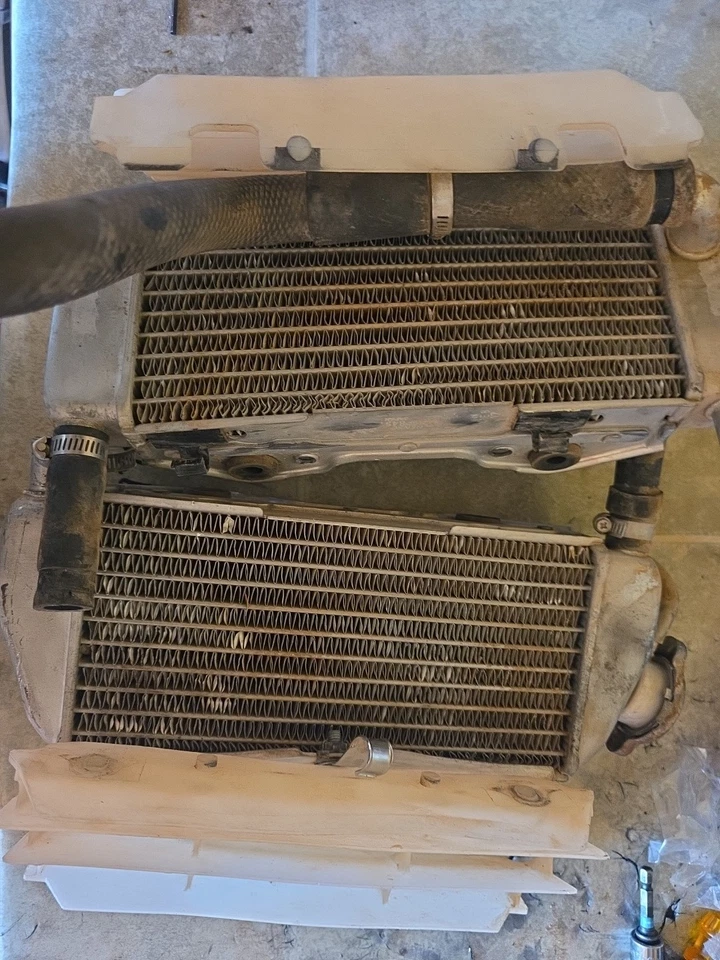 2003-2005 KX125 OEM KAWASAKI RADIATORS SET/ PART# 39061-0012, 39061-0013 - Image 1 of 4