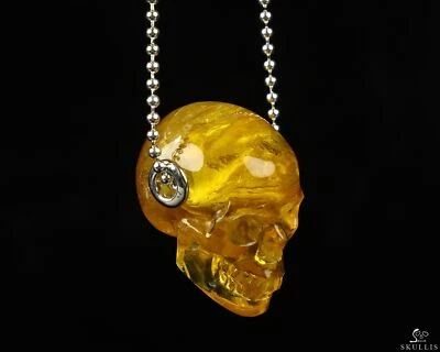1.1" Orange Fluorite Carved Crystal Skull Pendant with 925 Sterling Silver Chain - Image 1 of 4