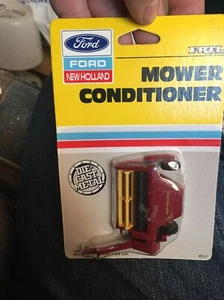 1/64 Ertl New Holland Mower Conditioner NIP - Picture 1 of 4