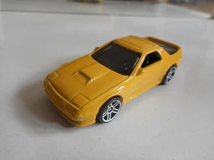 Hotwheels '89 Mazda Savanna RX-7 in Yellow - Picture 1 of 2