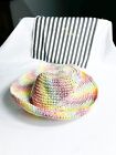 Lele Sadoughi raffia rainbow bucke hat. $145