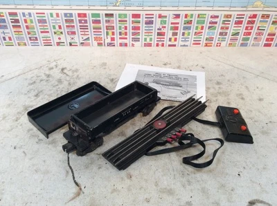 Lionel 3469  black  Dump Car w  UCS Remote Control Track O Gauge  Set Bin - Image 1 of 4