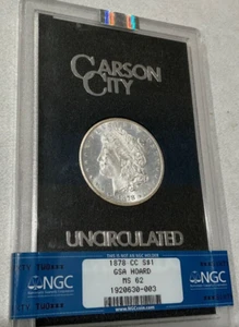 1878-CC $1 NGC/GSA HOARD MS 62 Morgan Silver Dollar - Picture 1 of 2