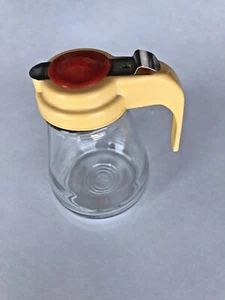 1 Vintage Creamer Syrup Dispenser Pitcher Clear with Red & Gold Top & Handle - Photo 1/3
