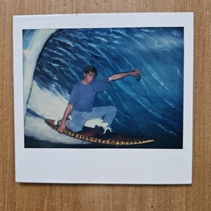 Vintage 1990s Polaroid Photo of Young Man Surfing in Jeans on Fake Background - Picture 1 of 3