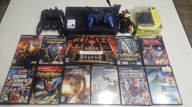 GUARANTEED PS2 3 Controllers 2 memory cards multi-tap 12 games including Diablo 