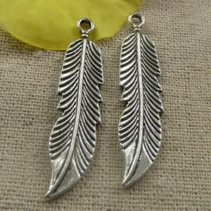 Envío gratuito 62 piezas Colgante Pluma de Plata Tibetana 45x11mm L-4372 - Imagen 1 de 4