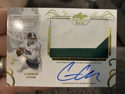2016 Leaf Trinity Signatures Player Worm Patch Connor Cook #A-CC1 Rookie Auto RC - Image 1 of 2
