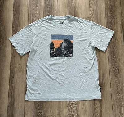 Женская футболка The North Face Never Stop Exploring синяя с коротким рукавом размер большой - Изображение 1 из 4