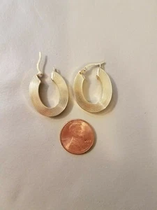14k Italy Marked Gold Earrings OVAL HOOPS. The weight is 3 g. - Picture 1 of 3