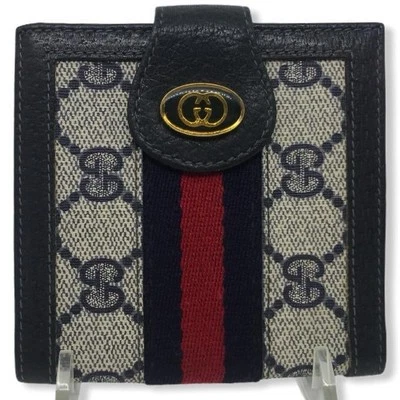 Cartera plegable Gucci GG de lona con monograma Foto 1 de 4