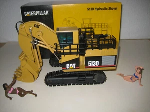 CATERPILLAR 5130 BAGGER HOCHLÖFFEL RAUPEN #391.1 NZG 1:50 OVP - Picture 1 of 4