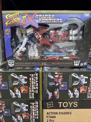 Transformers Street Fighter II x Optimus Prime Ryu vs Megatron M. Bison - Image 1 of 4