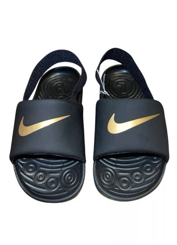 Nike Kawa Slides con cinturino sul tallone nero e oro bambino taglia 10C NUOVO