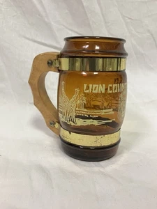 Vintage Travel Souvenir Siesta Ware Style Brown Glass Mug Lion Country Safari FL - Picture 1 of 6