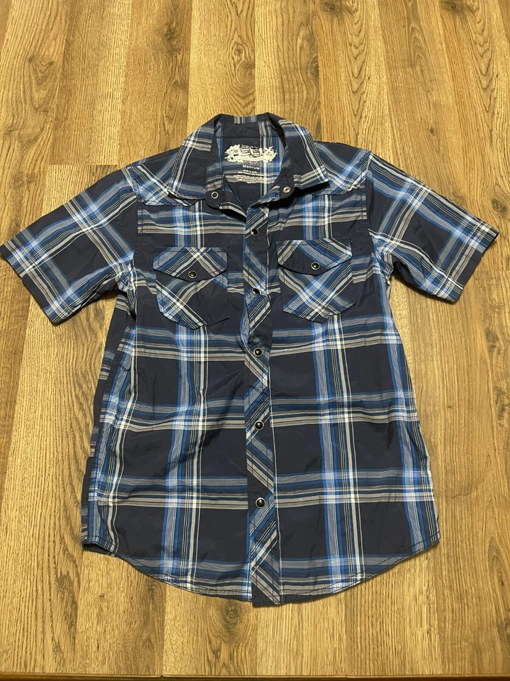 Camisa Helix, para niño talla mediana, azul, a cuadros, abotonada, manga corta, bolsillos Foto 1 de 4