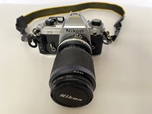 Nikon FG analoge Spiegelreflexkamera 35 mm mit Zoom-Nikkor Objektiv 35 ~ 105 mm 1:35 ~ 4 + Umhängeband - Bild 1 von 21