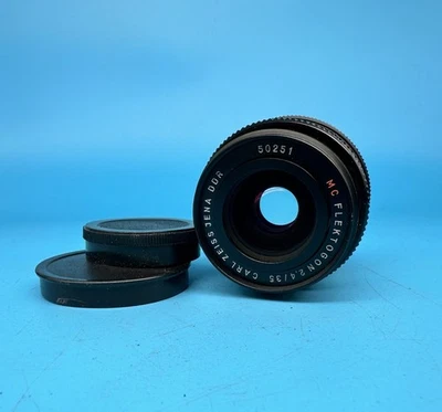 Carl Zeiss Jena Flektogon DDR Red MC 35mm F/2.4 M42 Screw Mount Lens with caps - Image 1 of 4