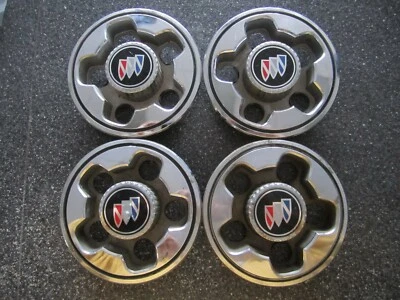 Juego de (4) tapas centrales Buick Skyhawk Skylark 13" OEM 1982-1989 22535837 1265 Foto 1 de 4