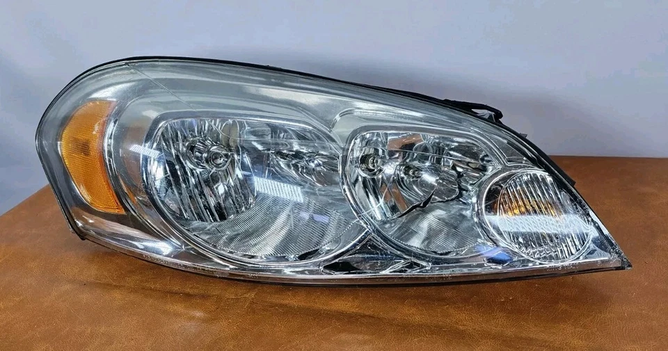 Faro halógeno pasajero derecho Chevrolet Impala 2006-2013 fabricante original usado #4 Foto 1 de 4