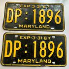 PAIR OF 3-31-67 BLACK AND GOLD MARYLAND CAR TAGS