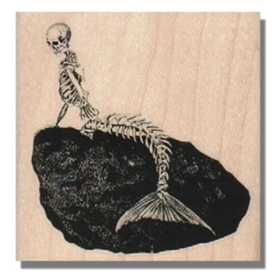 Sello de goma de madera, sirena esqueleto, playa, pez, roca, océano, mujer, miedo, gente, largo Foto 1 de 3