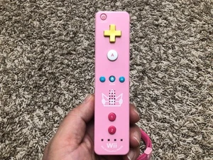 Mando a distancia Nintendo Wii Motion Plus Princess Peach OEM RVL-036 probado - Imagen 1 de 7