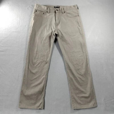Pantalones Kirkland Signature pierna recta beige frente plano para hombre talla real 36x29 Foto 1 de 4