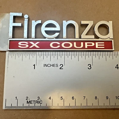 NOS Oldsmobile OEM 1982-1988 Firenza SX Coupe Fender Emblem Badge Logo Nameplate Foto 1 de 4