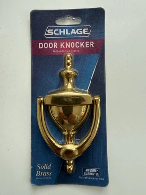 Golpeador de puerta de latón macizo Schlage, garantía de por vida. Foto 1 de 2