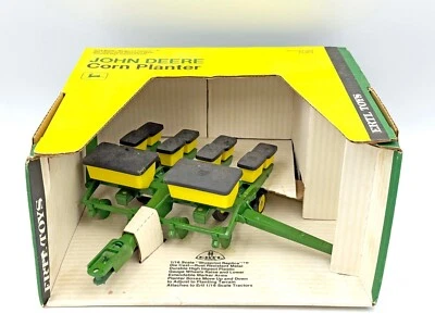 Maceta de maíz de cuatro filas John Deere serie 7000 1/16 en caja superior amarilla Foto 1 de 3