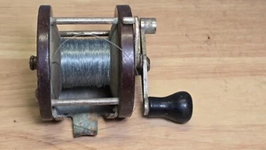 Vintage Unbranded Casting Reel Bakelite Sides Metal Handle Untested USA Look - Picture 1 of 5