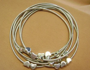 NWOT-- TEXTURED STRETCH WIRE MULIPLE HEARTS SILVER TONE BANGLE  BRACELET!!! - Picture 1 of 5