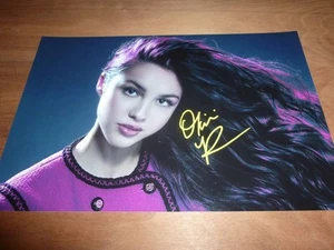 OLIVIA RODRIGO signed 12X8 photo + COA - Picture 1 of 2